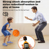 A boy is playing basketball indoors while a man demonstrates the strong shock absorption and noise reduction of the foam ball