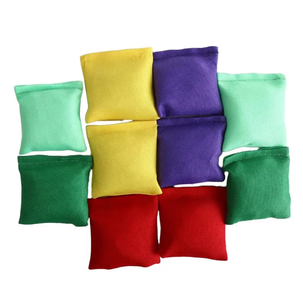 A collection of ten mini bean bags in various bright colors including yellow, purple, green, and red.