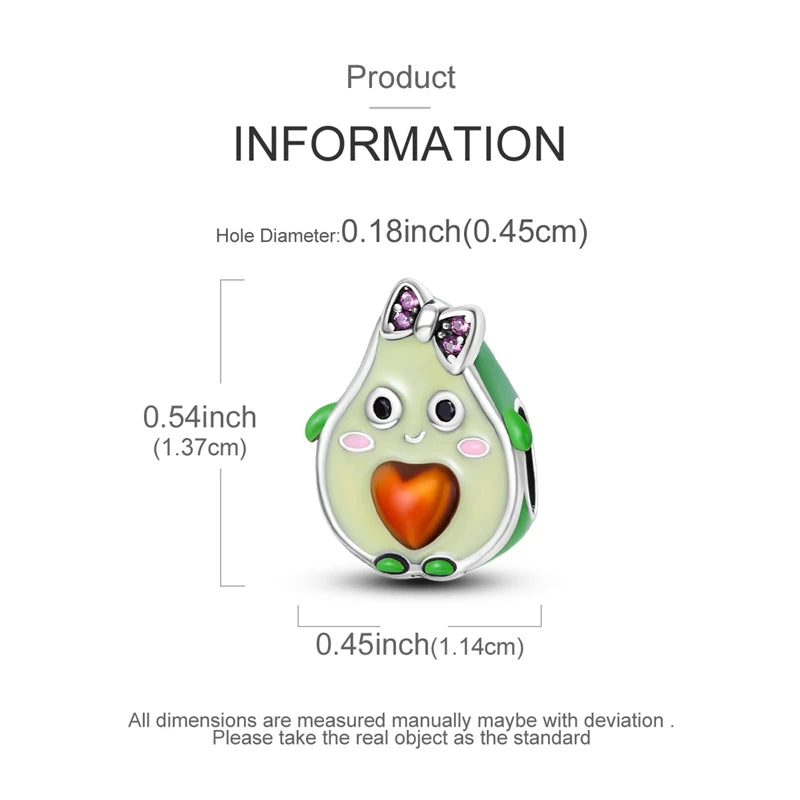 A small, pear-shaped charm with a green body and an orange heart detail, made of sterling silver.