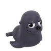 A dark gray rubber toy of a seal or sea creature with large eyes and a smooth body.