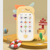 A yellow baby phone toy with a smiling face and various buttons, including music, sounds, and a teether attachment.