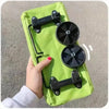 A lime green foldable portable shopping cart with black backpack straps and wheels is held by a hand.