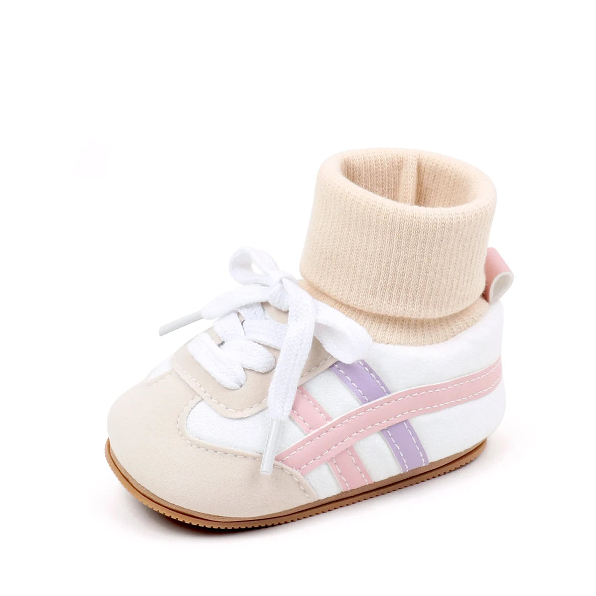 A pair of light beige baby booties with white laces and pink stripes on the side.