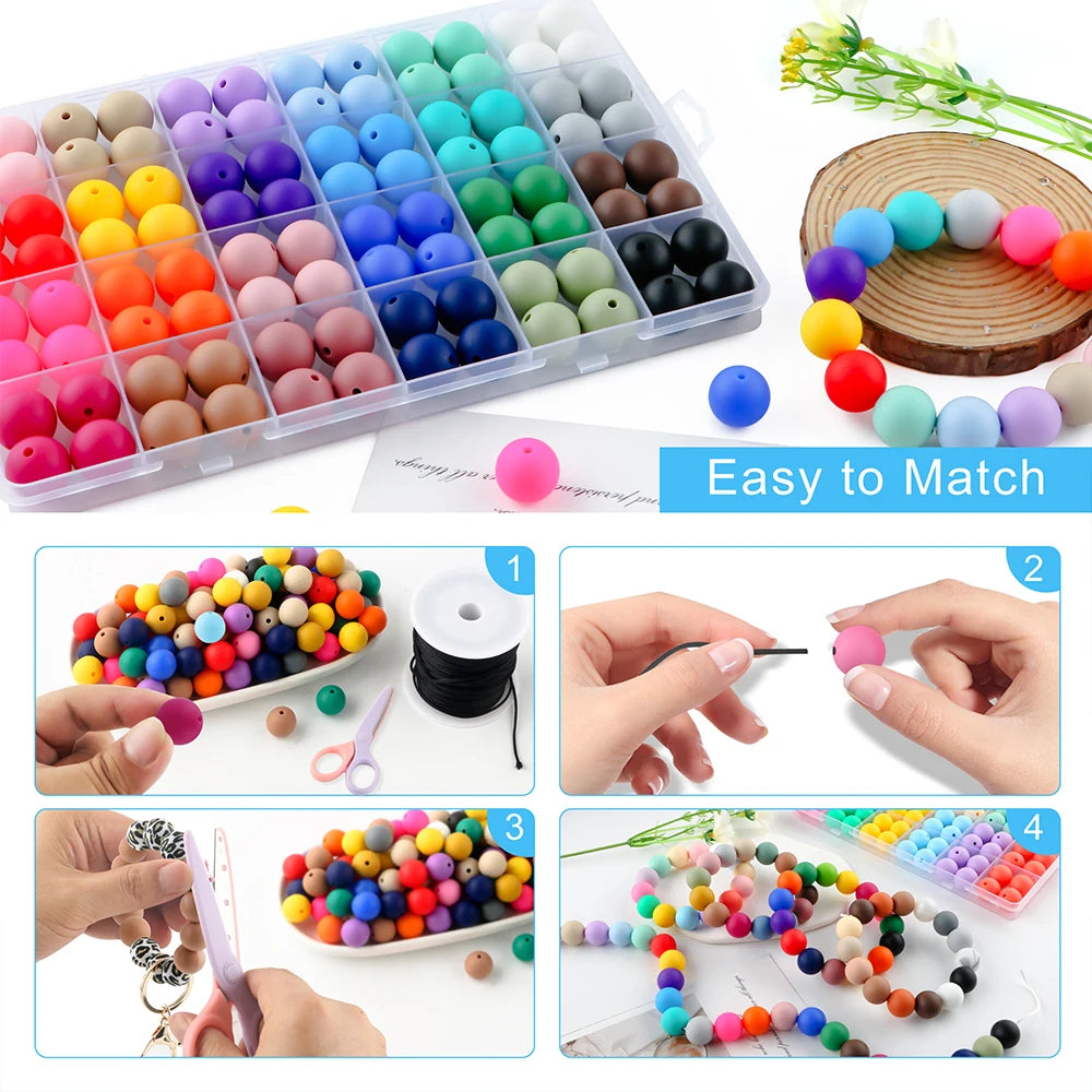 A variety of round silicone beads in various colors are displayed in a clear plastic box and scattered for matching.