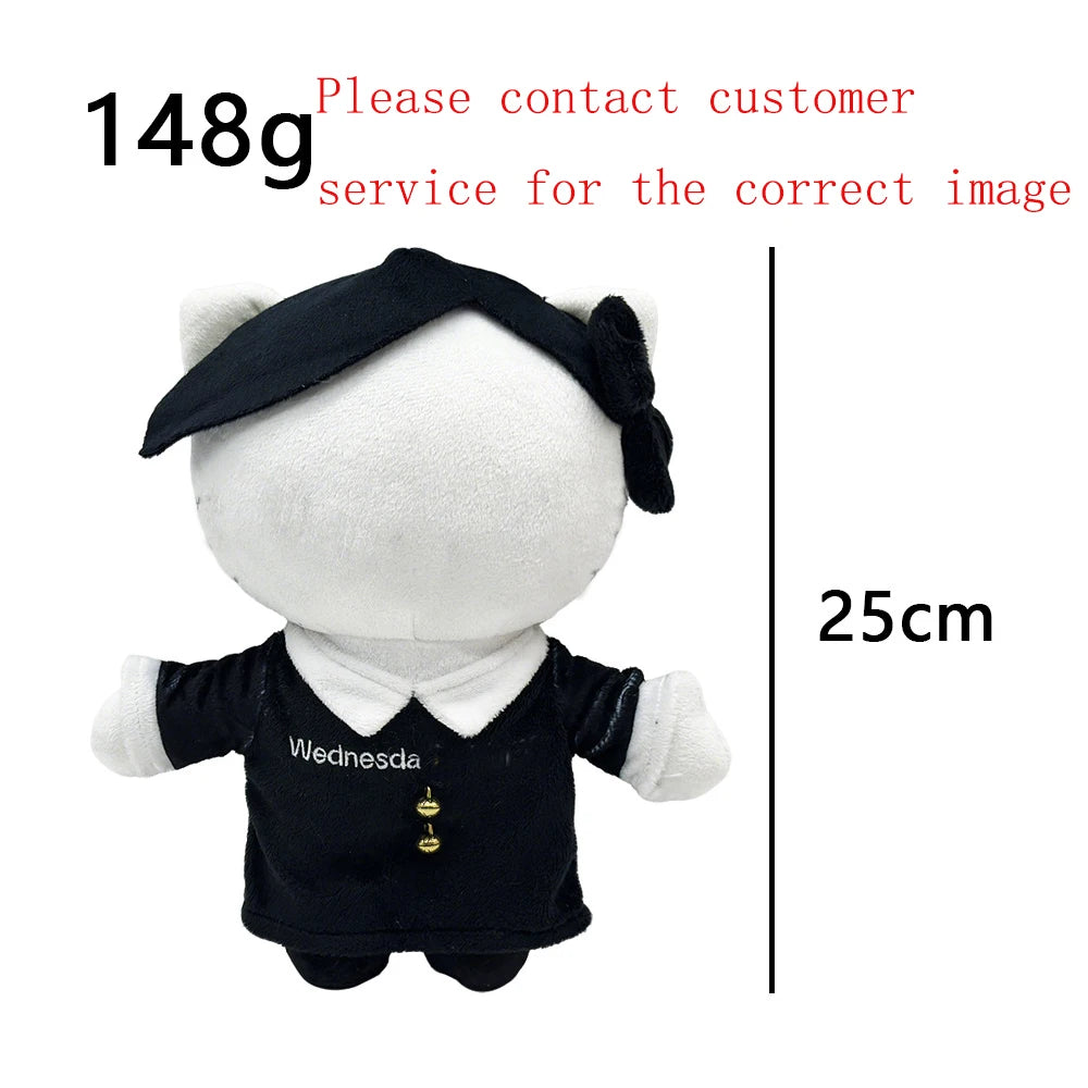 A white plush doll wearing a black outfit with gold accents, shown from the front.