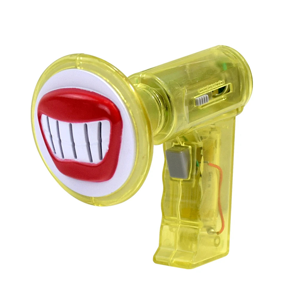 A yellow voice changer toy with a red mouth graphic and an electronic component.