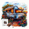 A jigsaw puzzle depicting a vintage camper van surrounded by lush flowers and foliage.