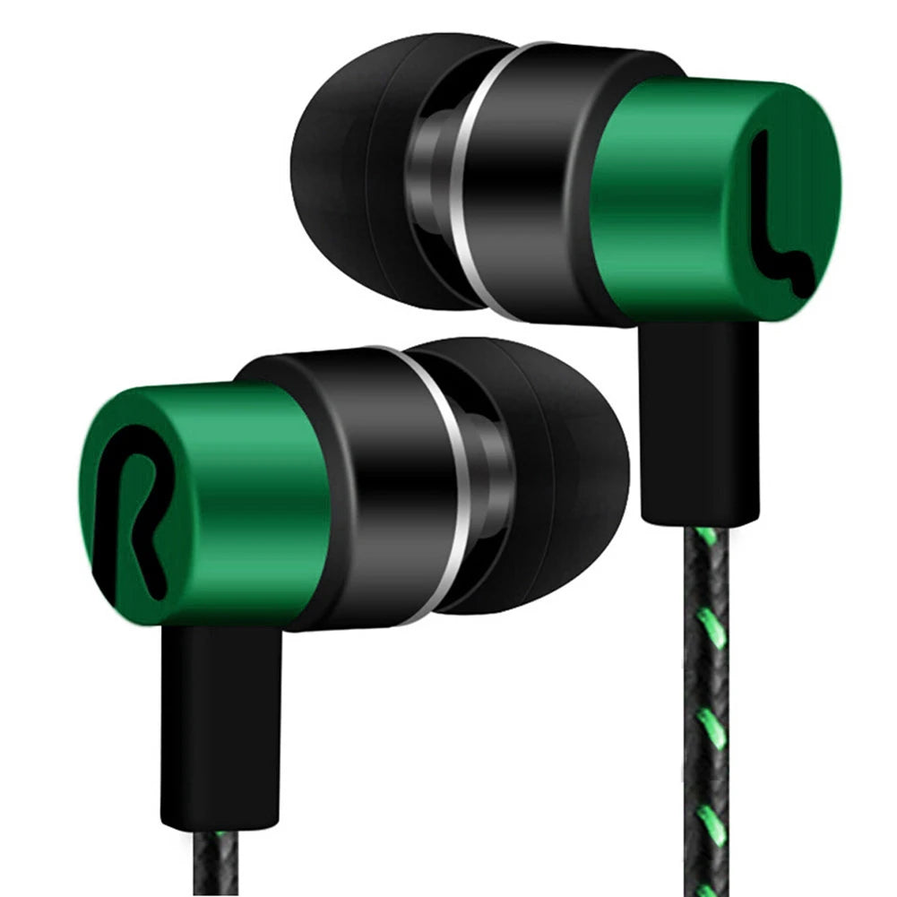 A pair of black and green in-ear wired earbuds with a black cord.