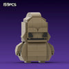 A tan LEGO minifigure-style haunted house set featuring a monster face and armor, displayed against a purple background.