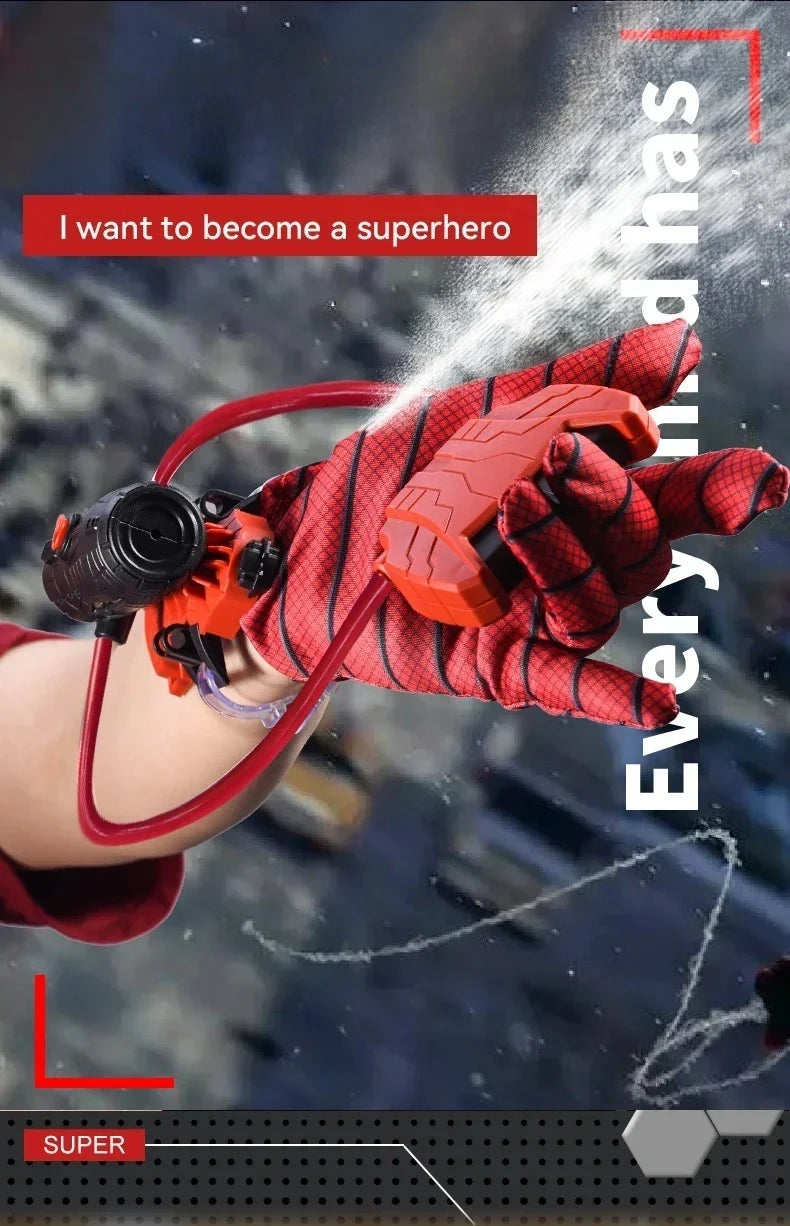 A hand wearing red gloves is firing a red wrist launcher water blaster, with text overlay saying I want to become a superhero