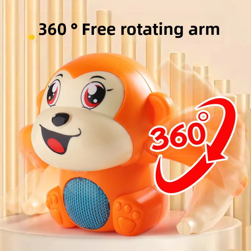Jouet singe électrique orange avec bras rotatif à 360 degrés.