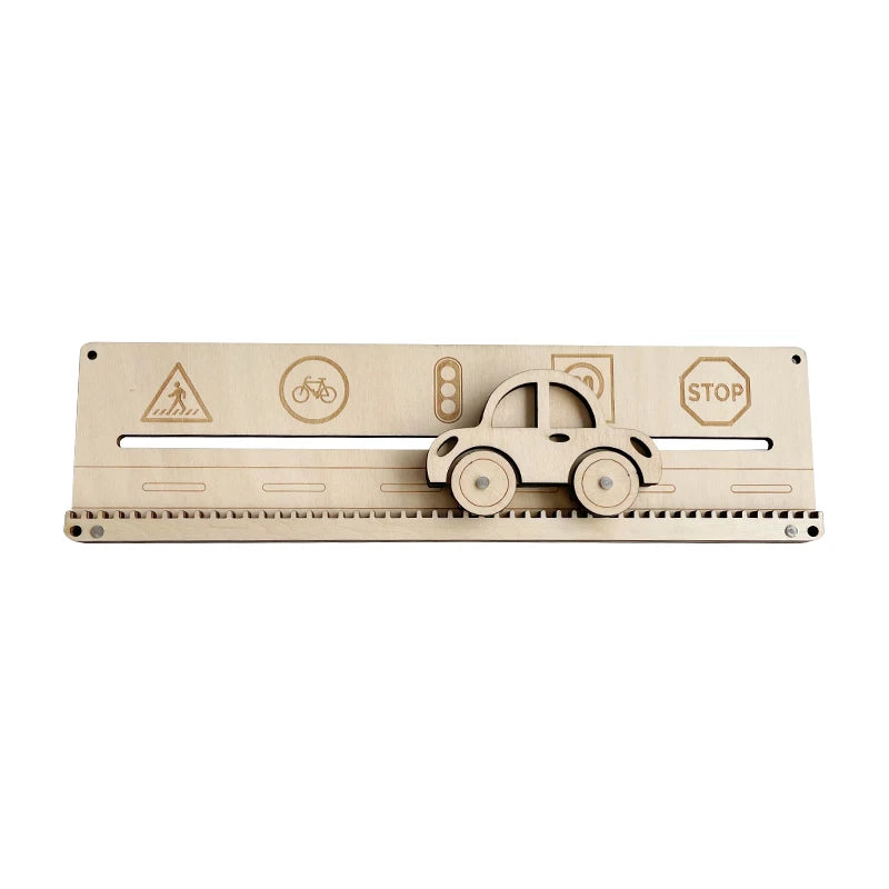 A wooden Montessori busy board featuring various symbols including a pedestrian sign, a bicycle, and a car.