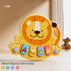 A yellow lion-shaped button background toy featuring various animal figures on its surface.