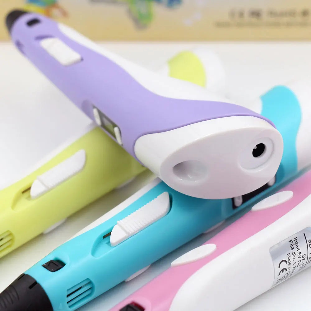 A close-up of a purple and white 3D printing pen with a light green body, showing the tip and plastic casing.