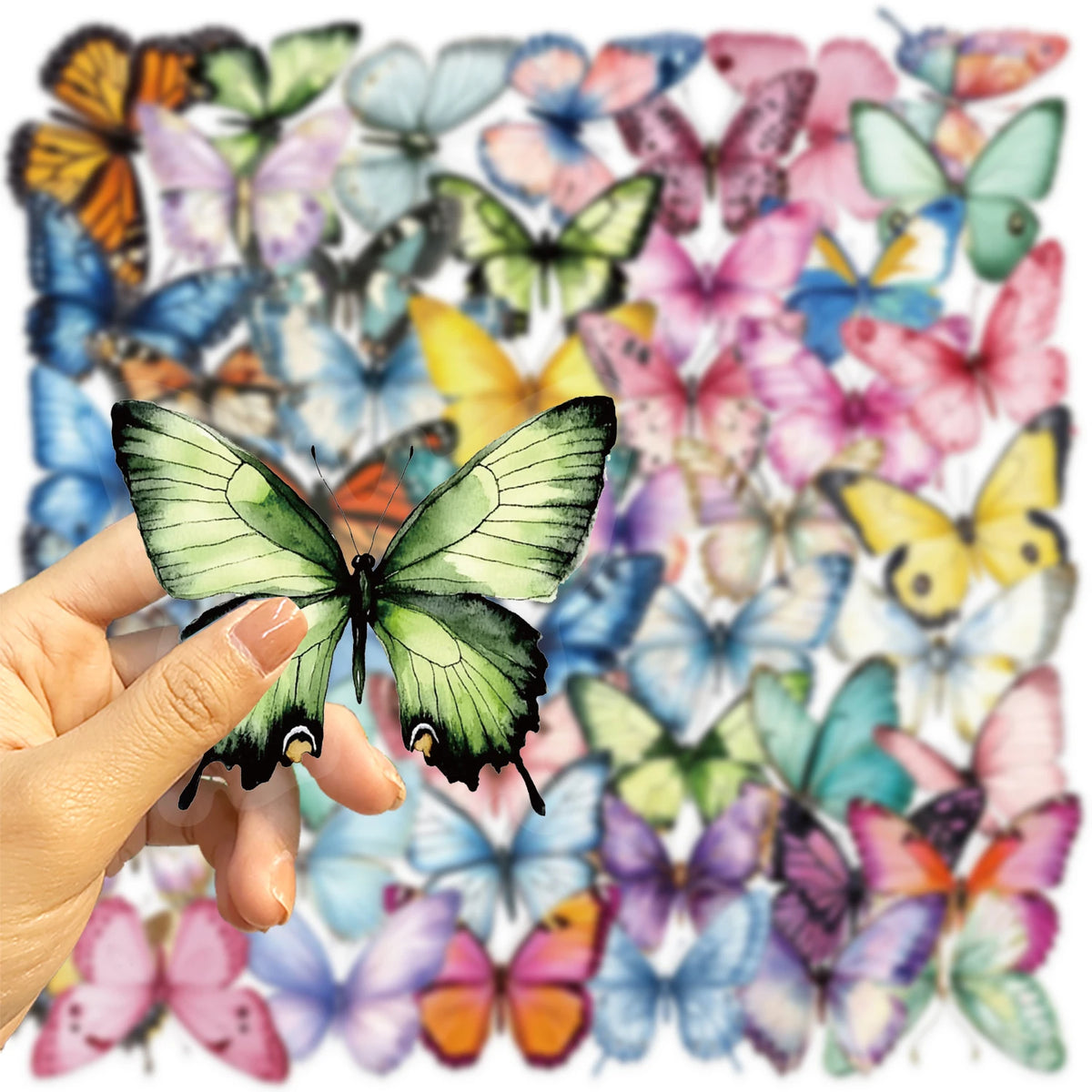 A hand holds a spread of vintage butterfly stickers in various colors and shades.