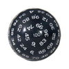 A close-up view of a black 100-sided polyhedral die with white numbers and dots.