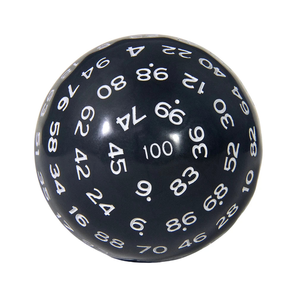 A close-up view of a black 100-sided polyhedral die with white numbers and dots.