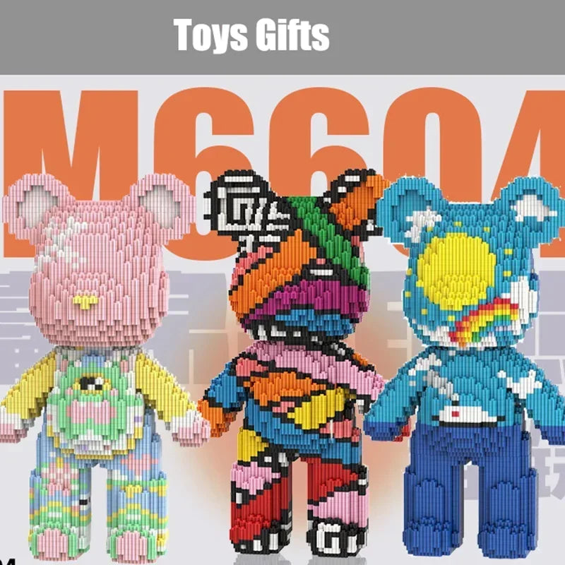 Three fully assembled 3D bear building kits made of micro diamond blocks in pink, orange, and blue.
