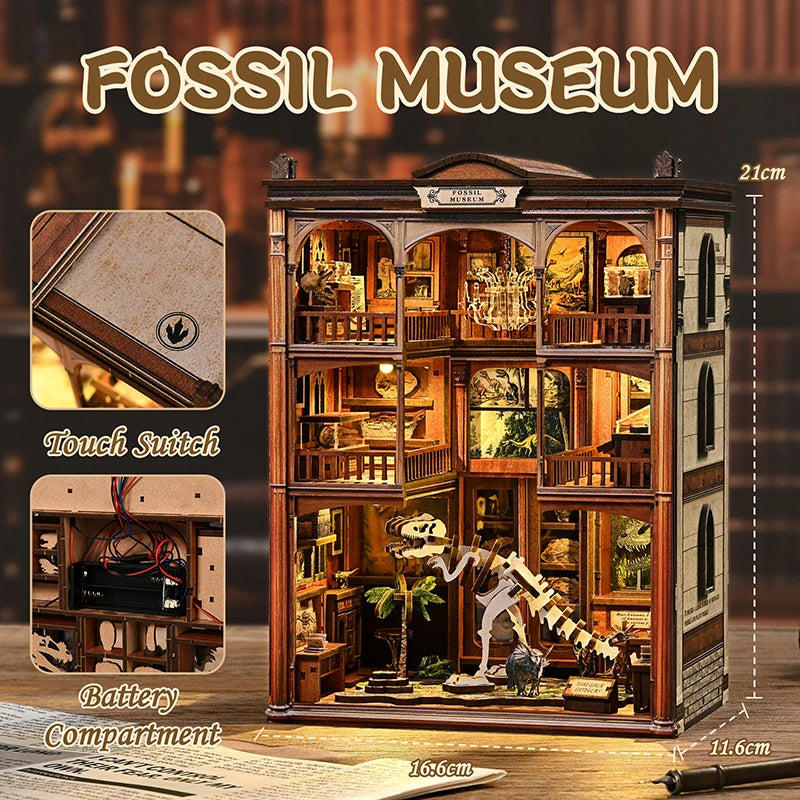 A wooden model kit of a fossil museum display featuring various dinosaur skeletons and geological elements.