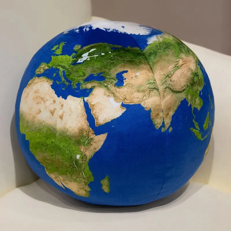 A blue globe depicting the continents of the Earth, showing green landmasses and brown/tan areas.
