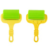 A pair of yellow silicone tools with bright green rubber spatulas for creative play dough