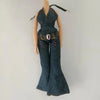 A stylish doll fashion set featuring a dark denim jumpsuit with floral embroidery and a matching scarf.