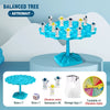 A balanced tree game featuring astronaut figures, dice, and a storage bag for kids.