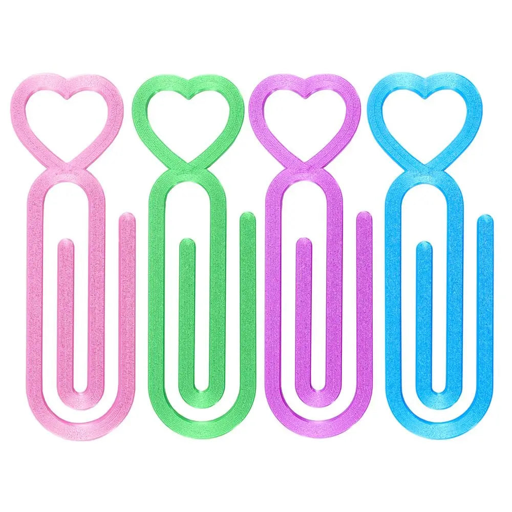A set of heart-shaped canvas clips in pink, green, purple, and blue for diamond painting or cross stitch.