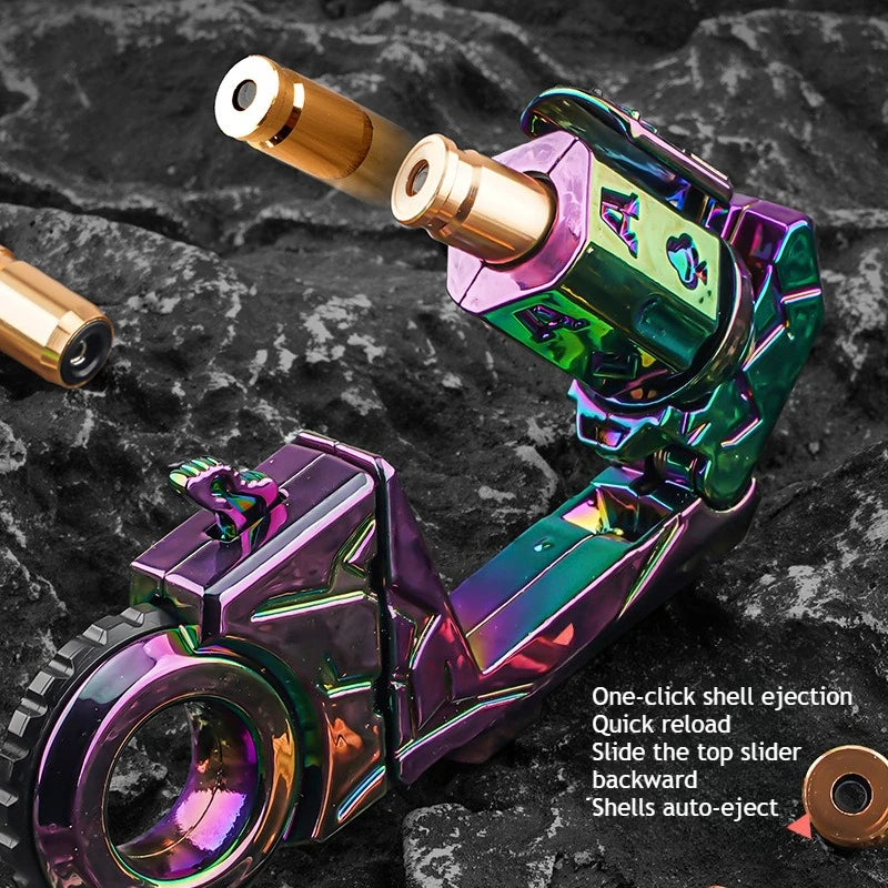 A close-up of a purple alloy fidget toy gun with a brass barrel and spinner mechanism.