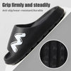 Black EVA slide slippers with a non-slip sole showing the tread pattern.