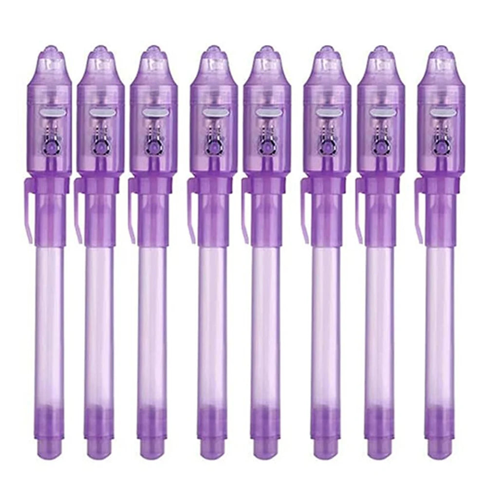 A set of invisible ink spy pens with UV light for writing secret messages