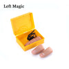 A yellow box containing a set of seven color-changing LED thumb lights for magic tricks.