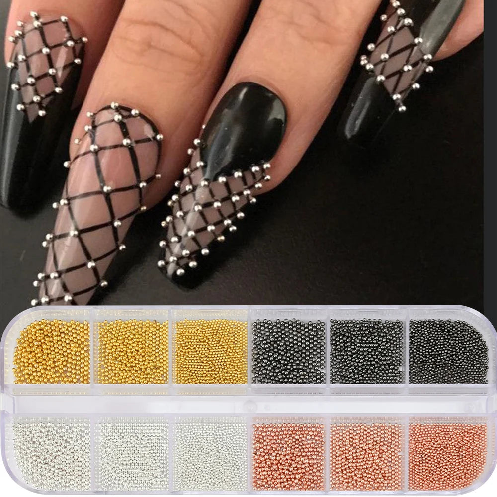A collection of gold and black caviar beads used for DIY nail art and charms.