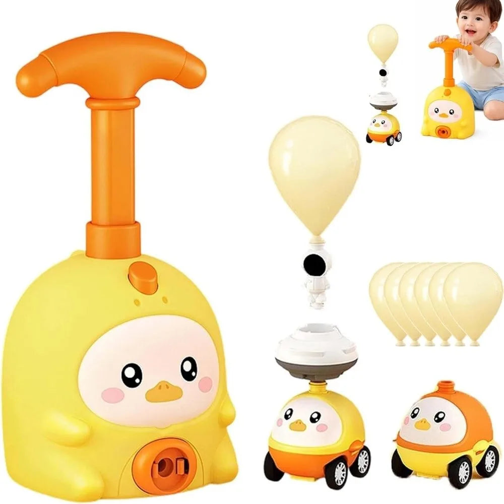 A yellow balloon-powered racing car toy with a launcher and several balloons.