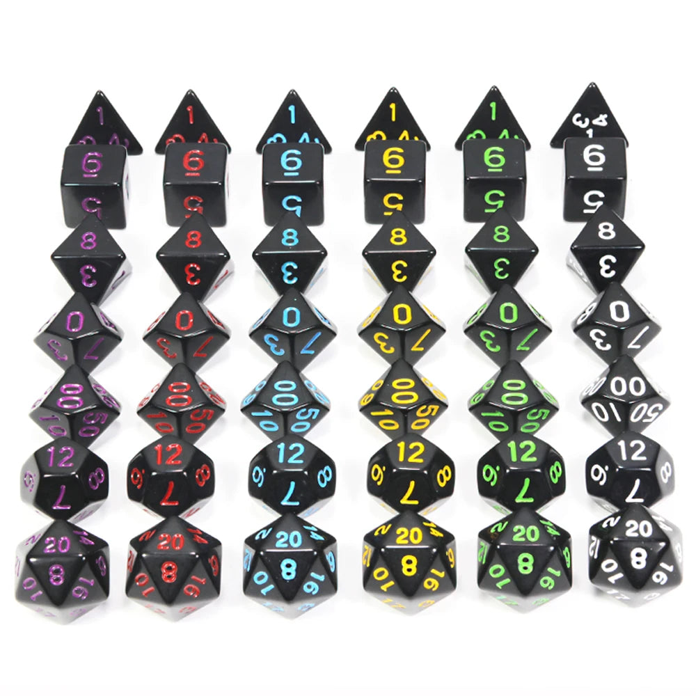 A set of black acrylic dice showing various numbered faces for tabletop role-playing games