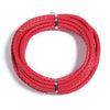 A coil of round red braided leather cord used for jewelry making and DIY crafts.