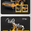 Die-cast toy excavator construction vehicle in yellow with swinging and rotating features.