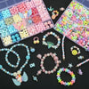 A collection of colorful polymer clay bead jewelry, including necklaces, bracelets, and earrings, arranged in small trays.