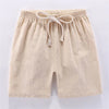 Beige kids cotton-linen summer shorts with an adjustable drawstring elastic waistband