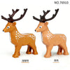 Two wooden deer models with antlers and spotted coats, showing different finishes.