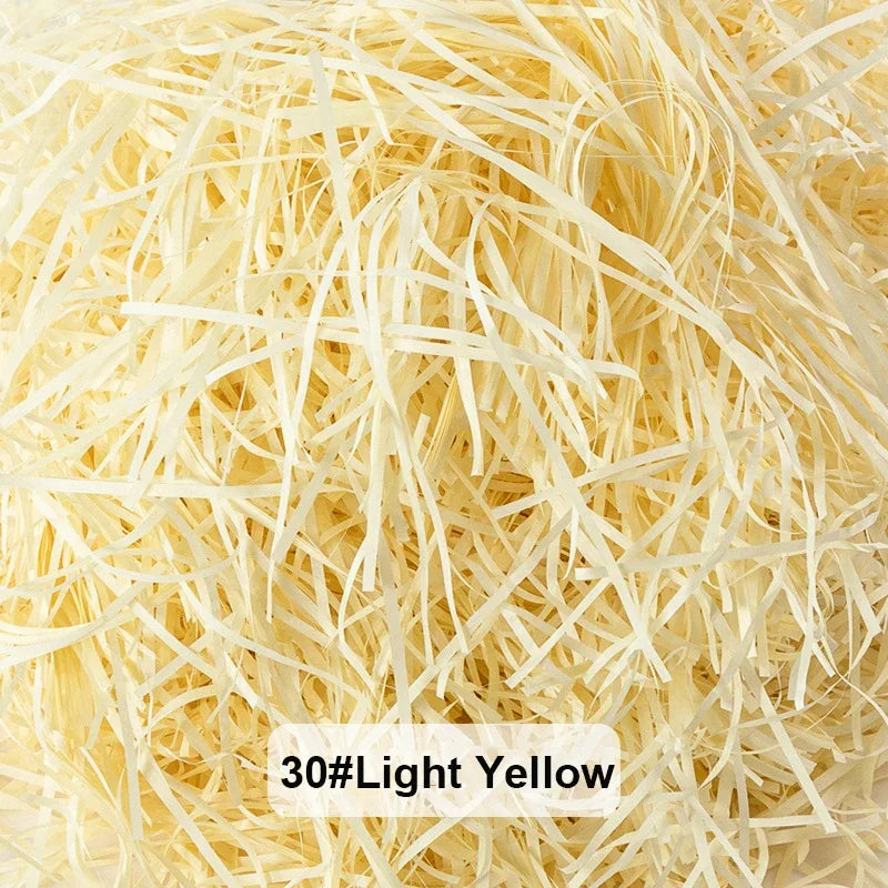 Light yellow raffia paper shreds for gift boxes and baskets