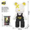 A white bear-shaped mini building block set with yellow accents and a black outfit.
