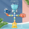 A set of colorful suction cup water spinner bath toys featuring a blue whale, an orange frog, and a yellow duck.