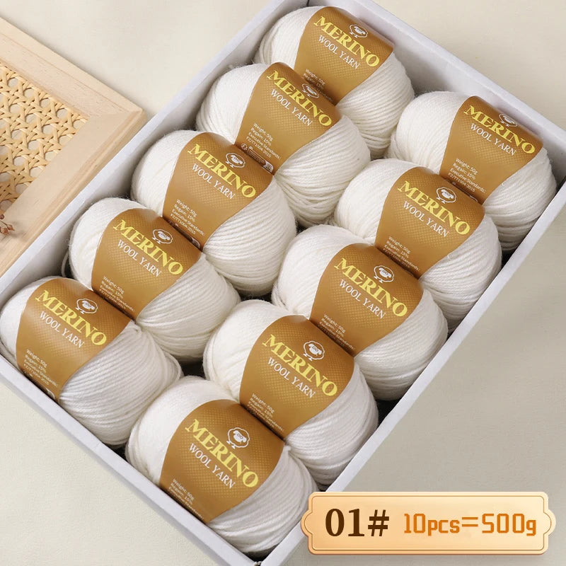 A box filled with ten balls of Merino wool yarn, labeled as 10 pieces equal to 500 grams.