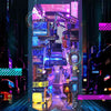 A detailed diorama of a cyberpunk interior featuring mechanical elements and neon lighting within a wooden book nook kit.