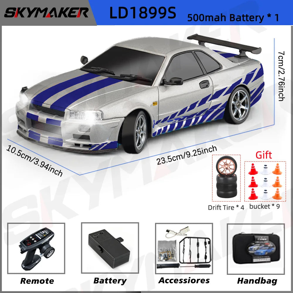 A silver 1/18 scale GTR R34 RC drift car with blue stripes is shown next to its remote, battery, accessories, and handbag.