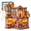 A detailed wooden 3D puzzle model kit of a coffee factory building with various elements and music box features.