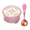 A pink wax seal melting kit featuring a lid with a heating element and a metal spoon.