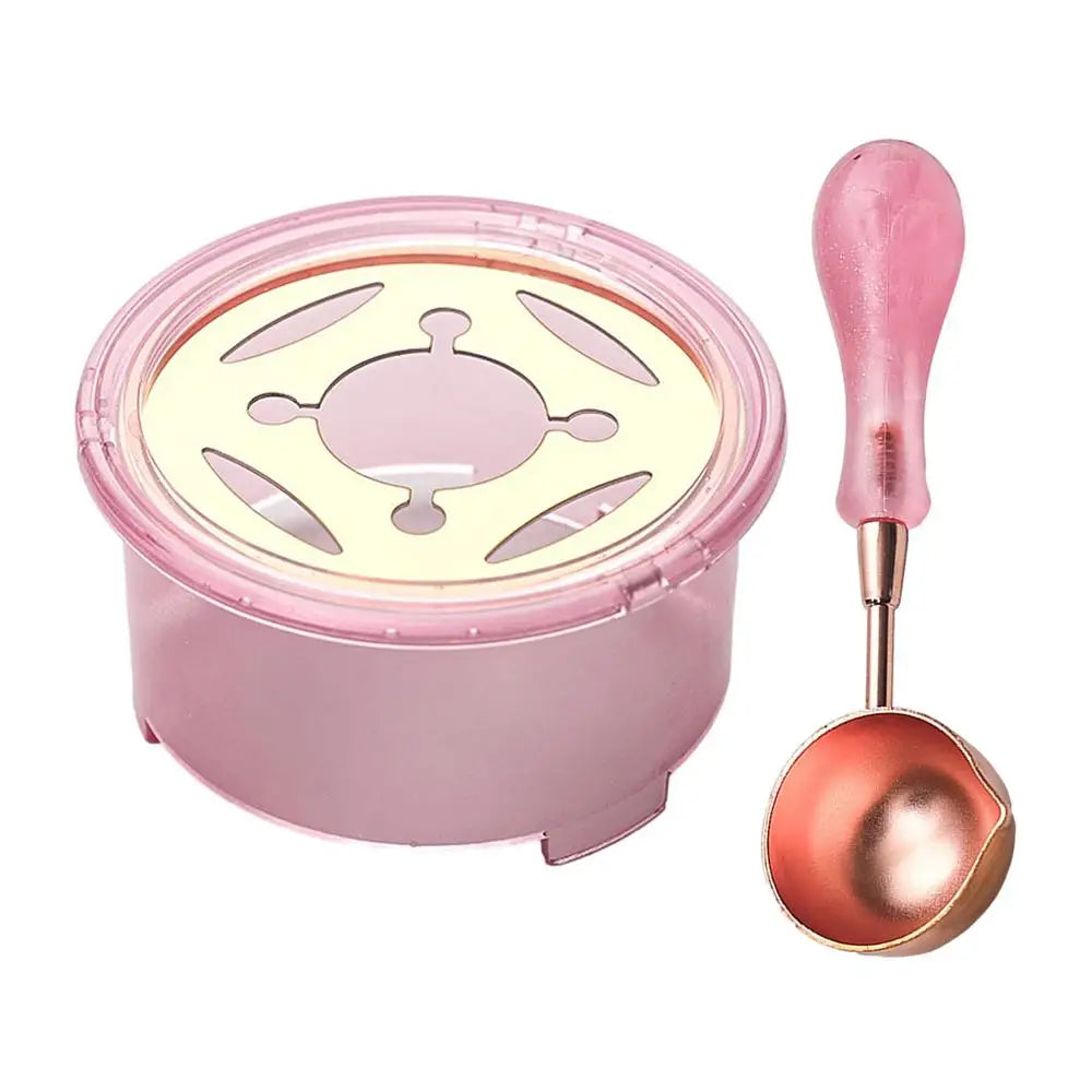A pink wax seal melting kit featuring a lid with a heating element and a metal spoon.