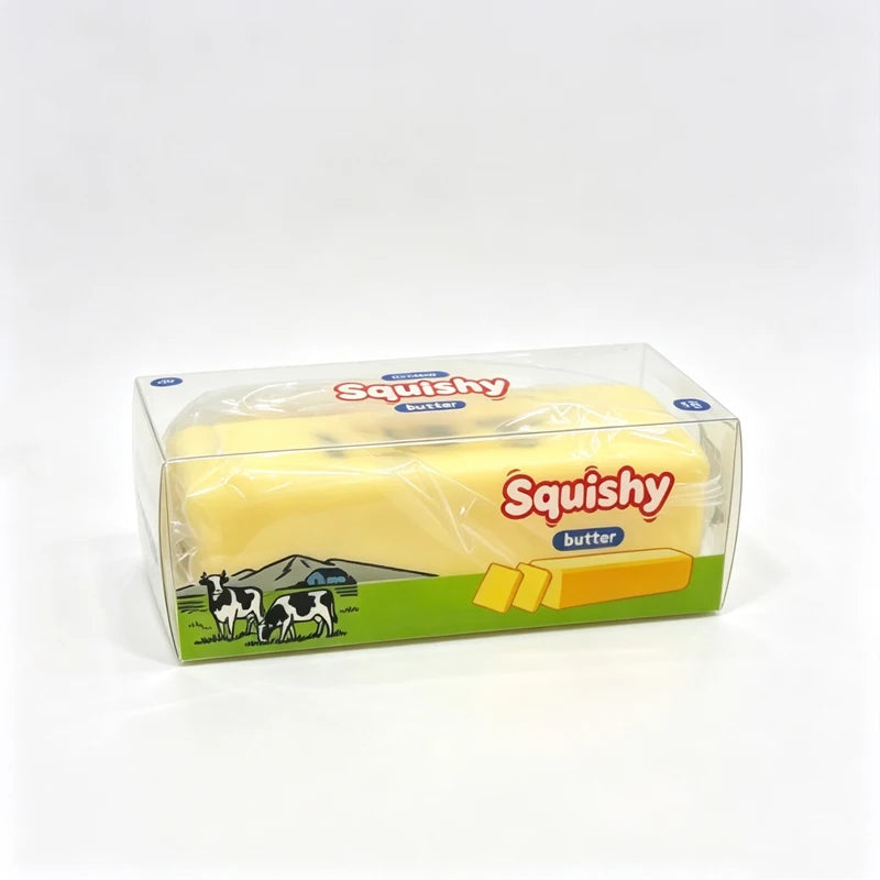 A clear plastic package of Squishy butter yellow fidget toy